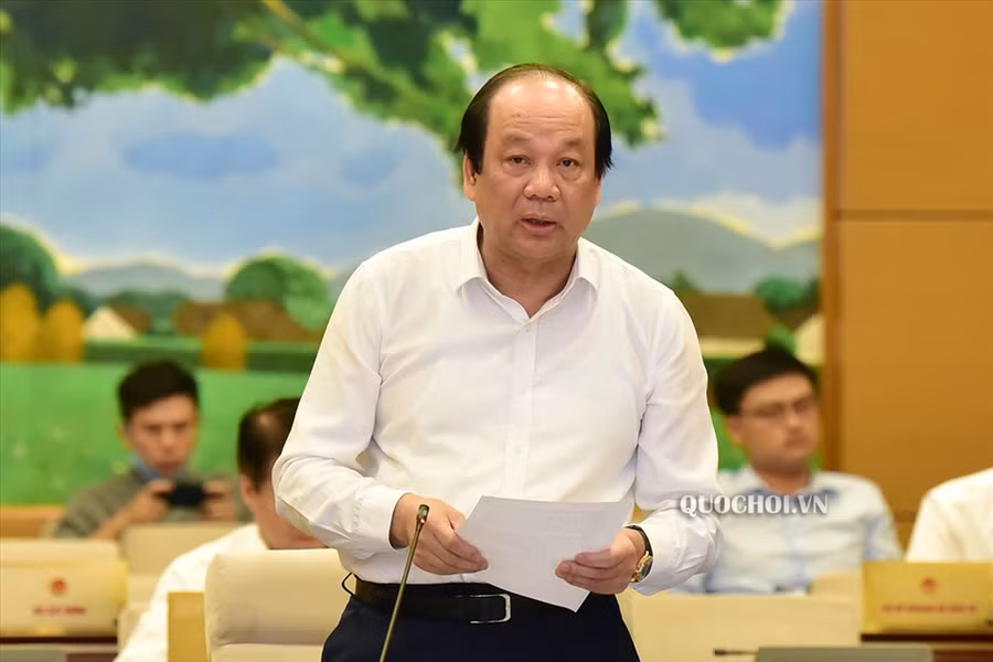 Bộ trưởng, Chủ nhiệm Văn phòng Chính phủ Mai Tiến Dũng trình bày báo cáo. Ảnh QH