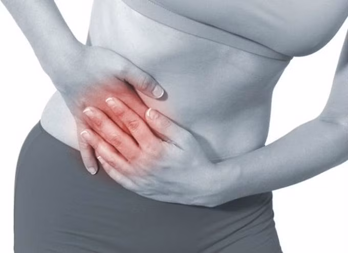 Đau bụng và thường xuyên xì hơi là một trong những triệu chứng của ung thư ruột