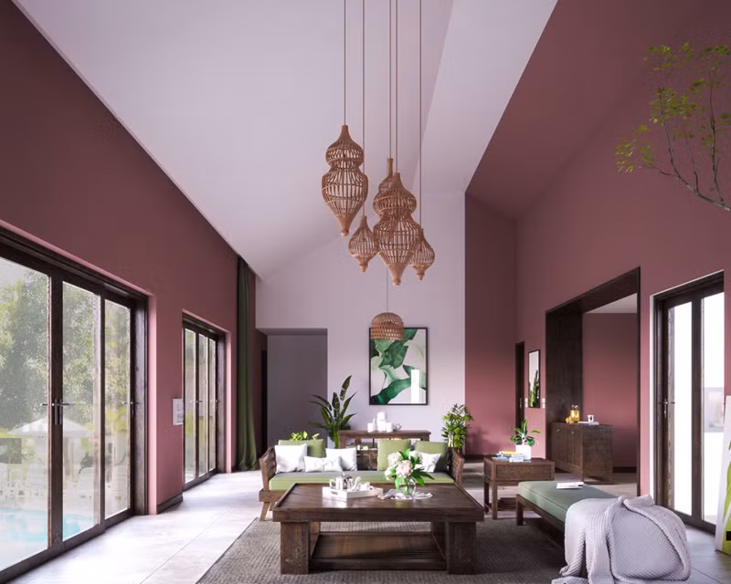  Phòng khách màu hồng sẫm tạo điểm nhấn bằng một dải tường màu trắng ở giữa.