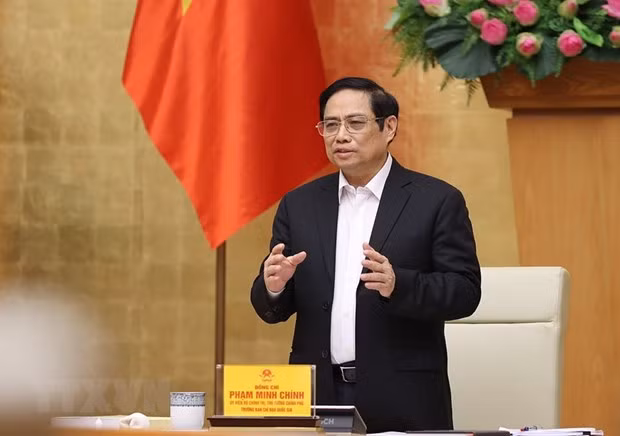 Thủ tướng Phạm Minh Chính chủ trì sơ kết công tác phòng, chống dịch COVID-19 trong đợt bùng phát lần thứ 4. Ảnh: Dương Giang/TTXVN