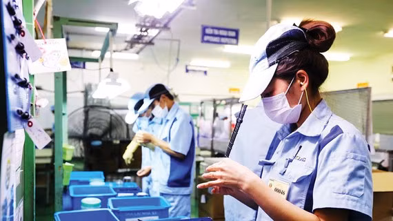 Hoạt động sản xuất tại một doanh nghiệp FDI Nhật Bản. Ảnh: QUANG PHÚC