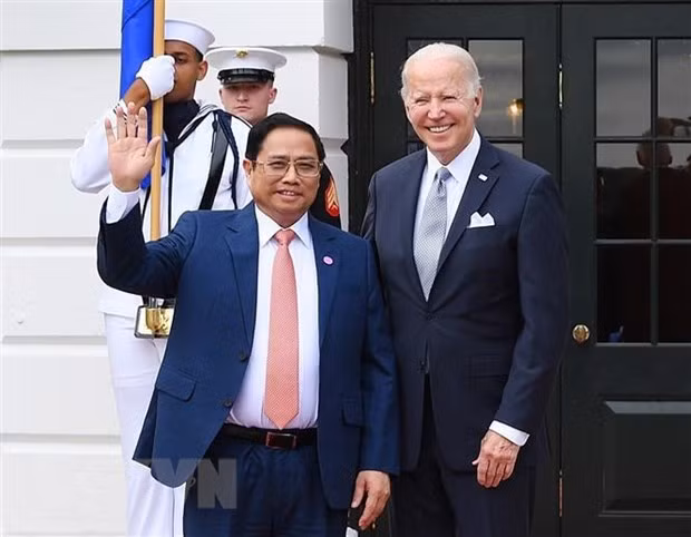 Tổng thống Hoa Kỳ Joseph Robinette Biden Jr. đón Thủ tướng Phạm Minh Chính. (Ảnh: Dương Giang/TTXVN)