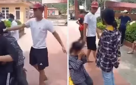 Nữ sinh bị thanh niên xông vào trường tát, bắt quỳ gối giữa sân trường. Ảnh cắt từ clip