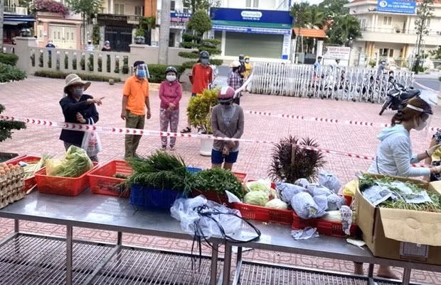  Một điểm bán hàng bình ổn của Tổng công ty Công nghiệp thực phẩm Đồng Nai (Dofico) ở thành phố Biên Hòa. (Ảnh: TTXVN phát)