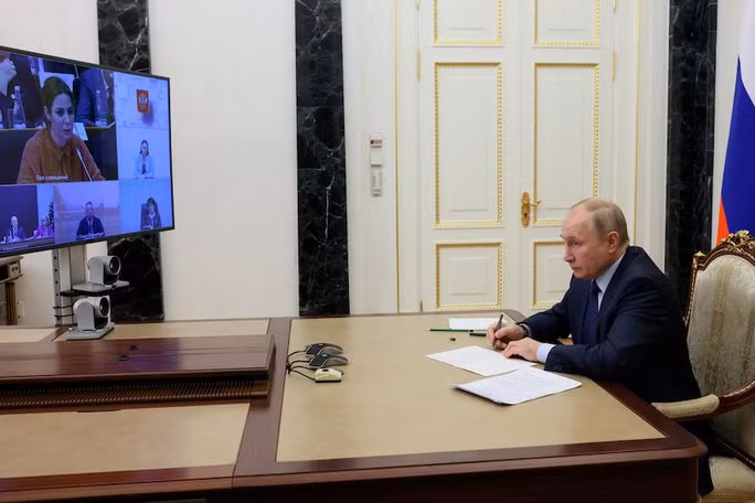 Tổng thống Putin trong cuộc họp với Hội đồng Xã hội Dân sự và Nhân quyền Nga ngày 7-12. Ảnh: AP
