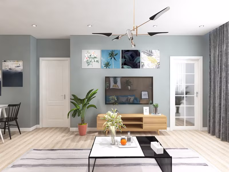 Tường được trang trí bằng tranh hình cây cối.