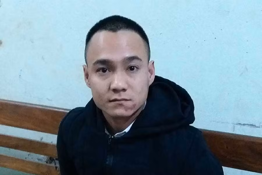 Đối tượng Trần Đức Thành tại cơ quan công an. Ảnh: Thế Chiến