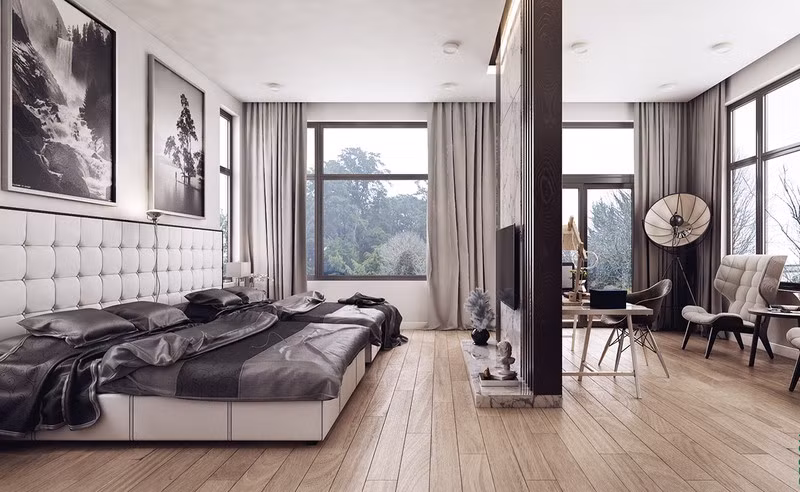  Tường gỗ ngăn cách khu vực giường ngủ với phòng làm việc.