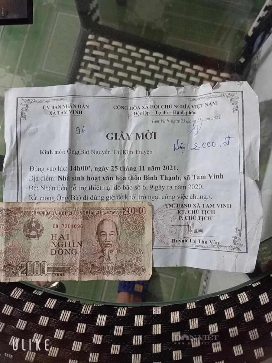  Một hộ dân ở xã Tam Vinh, huyện Phú Ninh được hỗ trợ 2.000 đồng ảnh hưởng bão, lũ năm 2020 (Ảnh: Nguyễn Truyện)
