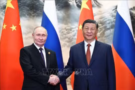 Chủ tịch Trung Quốc Tập Cận Bình (phải) và Tổng thống Nga Vladimir Putin tại cuộc gặp ở Bắc Kinh ngày 16-5-2024. Ảnh tư liệu: AFP/TTXVN